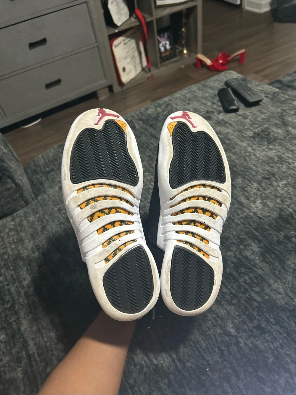 Jordan 12s Men's Black and White High-Top Sneakers with Gold Eyelets